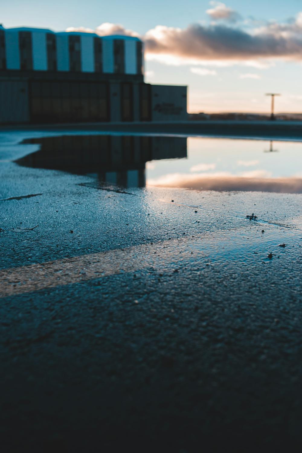 Deteriorating concrete patio surface with pitting and scaling damage from Kansas City weather