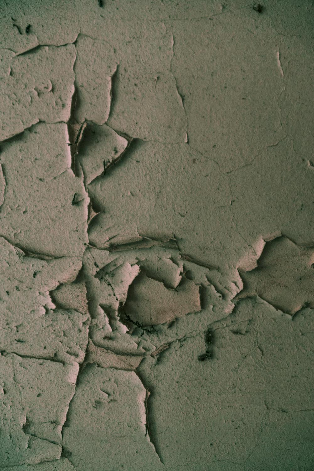 Weathered cracked concrete surface needing fall crack repair and sealing